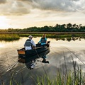 Old Town Discovery Sport 15 canoe being used on a lake