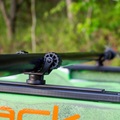 YakAttack RotoGrip Paddle Holder mounted to the slide tracks on a kayak