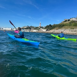 Paddling the Design Kayaks Unplugged sea kayak in Plymouth Sound, Devon